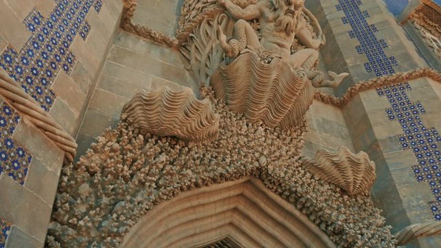 Close-up shot featuring gorgeous sculpted detail at the entrance of the Pena Palace (Pal&aacute;cio da Pena) in Sintra, Portugal
