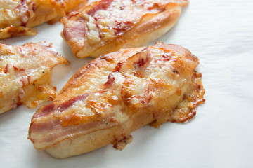  bacon and mozzarella  cheese on bread