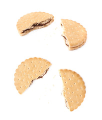 Broken into pieces cookie isolated over the white background