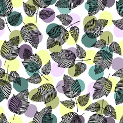 Seamless pattern with hand drawn leaves on a polka dot background.