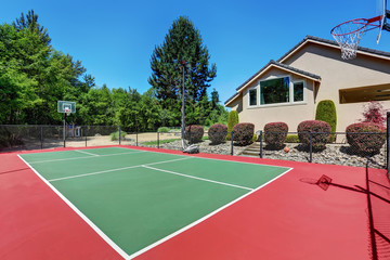 Private basketball court of Suburban luxury house © Iriana Shiyan