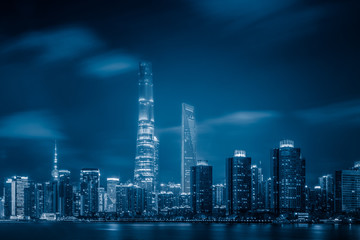 Shanghai skyline panorama at night in blue tone.