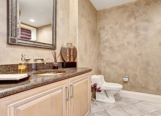 Luxury half bathroom interior with  modern vanity cabinet