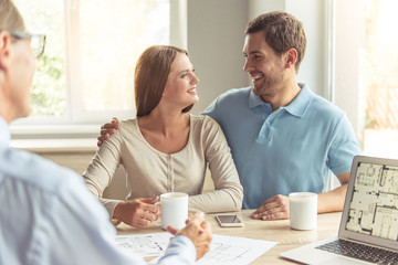 Couple visiting realtor