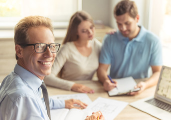 Couple visiting realtor