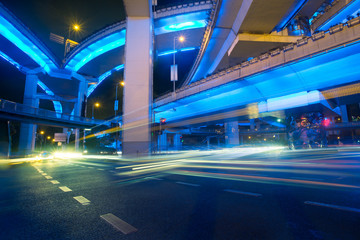 City view at night with traffic and trail light in Shanghai,China.