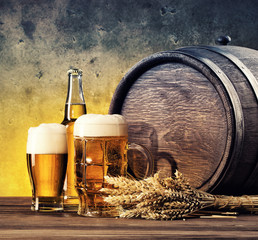 Still life with glasses of beer and barrel