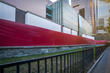 empty sidewalk of modern financial buildings in China.