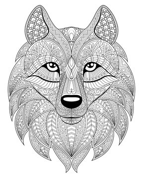 Wolf head in zentangle style. Adult antistress coloring page. Black and white hand drawn doodle for coloring book. Ethnic pattern, ornament.