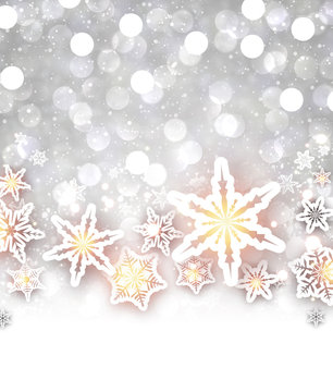 Winter shining background with snowflakes.