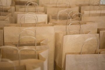 Brown paper bags in rows