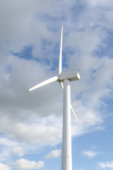Wind mill against sky for energy power production