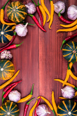 Fresh organic vegetables on wooden background, autumn concept