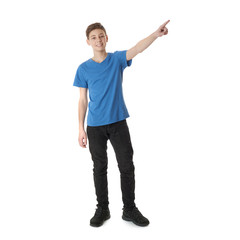 Naklejka premium Cute teenager boy over white isolated background