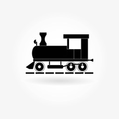 Vector illustration of a toy locomotive silhouette on a railway and gray gradient background with shadow 