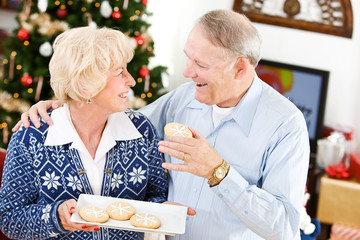 Christmas: Husband Taking A Holiday Cookie