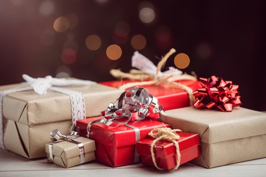 Composite image of presents on table 