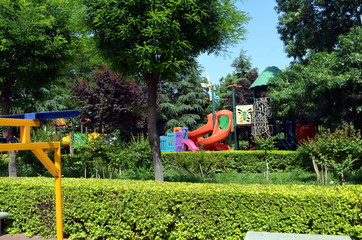 Fototapeta na wymiar children's playground in the middle of a public park