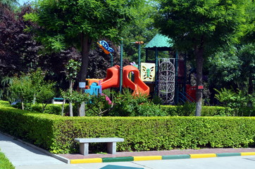 children's playground in the middle of a public park
