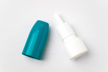 Plastic nasal spray container on white background.