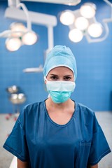 Fototapeta na wymiar Portrait of surgeon standing in operation room