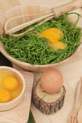 Egg and vegetables acacia pennata for omelet cooking.