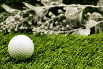 golf ball on green course background idea for Christmas theme