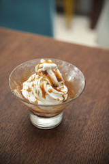 ice cream topped with caramel