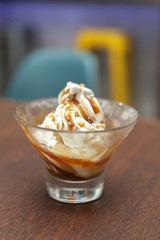 ice cream topped with caramel