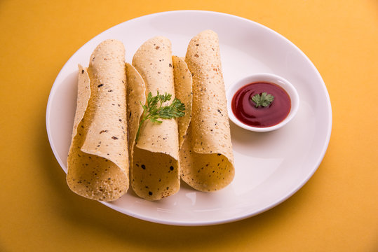 rosted papad or roll papad, indian traditional started food or side dish