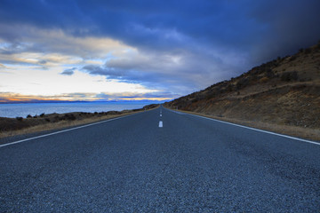 asphalt highway in aoraki - mt.cook national park new zealand