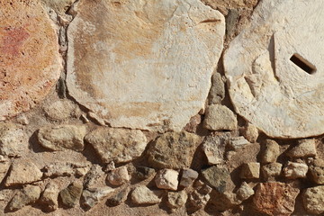 Background composed of stones of different sizes, colors and textures