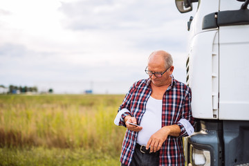 Checking his mobile phone