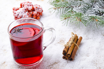 cup of hot wine on a table