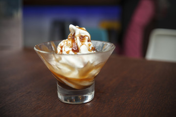 ice cream topped with caramel