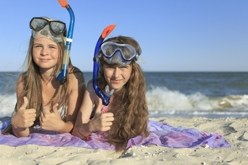 Girl with mask and snorkel for scuba diving.
