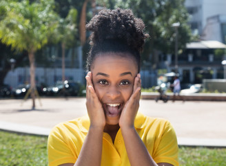 Fototapeta premium Woman with amazing hairstyle is surprised