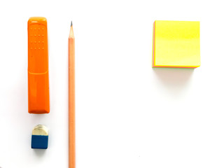 Paper note, pencil, rubber and stapler