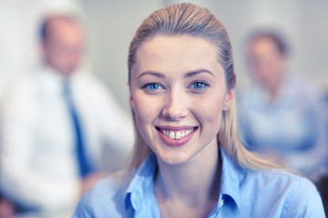 Fototapeta premium group of smiling businesspeople meeting in office