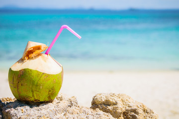 Coconut cocktai on a tropical beach