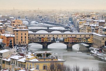 Ponte Vecchio or Old Bridge Florence Italy with snow panorama Tuscany, view from Piazzale...