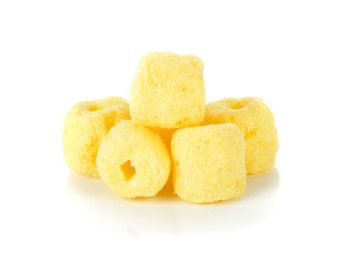 Crunchy corn snacks on a white background