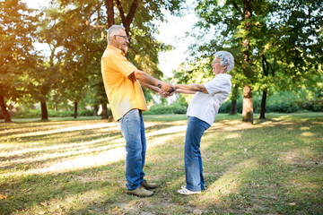 Senior happy couple enjoy at park together