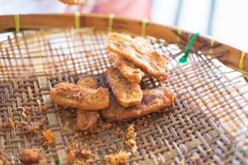 fried bananas on rattan tray