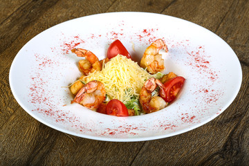 Caesar salad with tiger shrimps