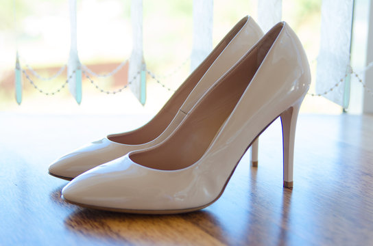 Women's high heels. Bride shoes close up