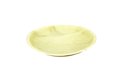 Fallen dried palm leave plate isolated on white background.