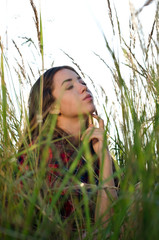 Fototapeta premium girl walking in field
