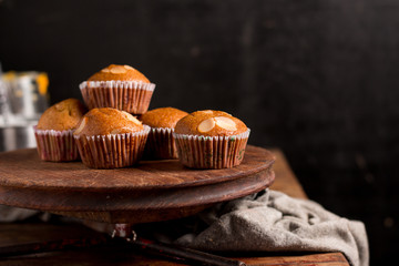 Banana Cake on vintage wooden background. Dark food photo