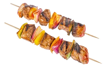 Fototapeten Skewer set of red meat and vegetables, isolated on white background. © michelaubryphoto